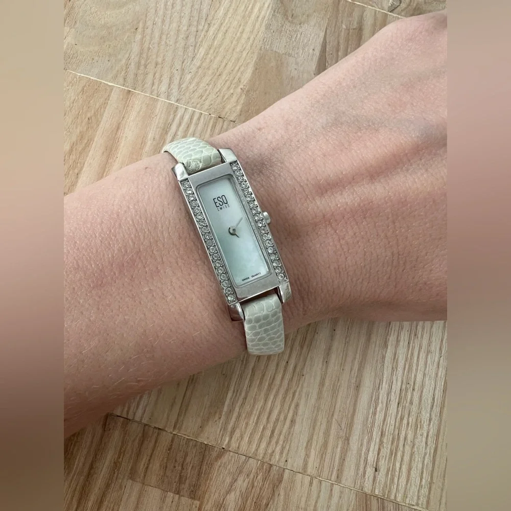 ESQ by Movado ladies skinny silver tone rectangular dress watch NEW BATTERY